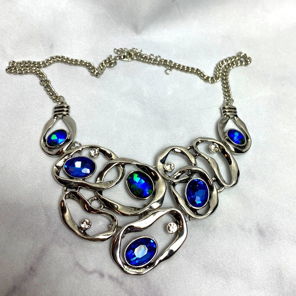 Asymmetrical Curl White Rhinestones And Blue Warp Speed Necklace